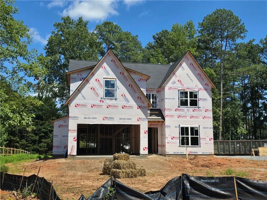 New Construction - Modern farmhouse plan that has 5 Bedrooms & 5 Full Bathrooms. Property features an open kitchen, Quartz Counter tops, Tile back splash, SS appliances, double oven, gas cook-top, Large Island w/ views to the family room. 10 foot ceilings with 8 foot tall doors on the first floor, full bed/bath on the main level. Large owner's suite and private owner's bath with large walk-In closet, freestanding tub. Laundry on the upper level. Huge covered patio overlooking your private back yard. Large two car garage plus flat level back yard, ready for a pool! 0.656-acre lot, quiet neighborhood with NO HOA, close to shopping and restaurants. Southern Living Custom Builder