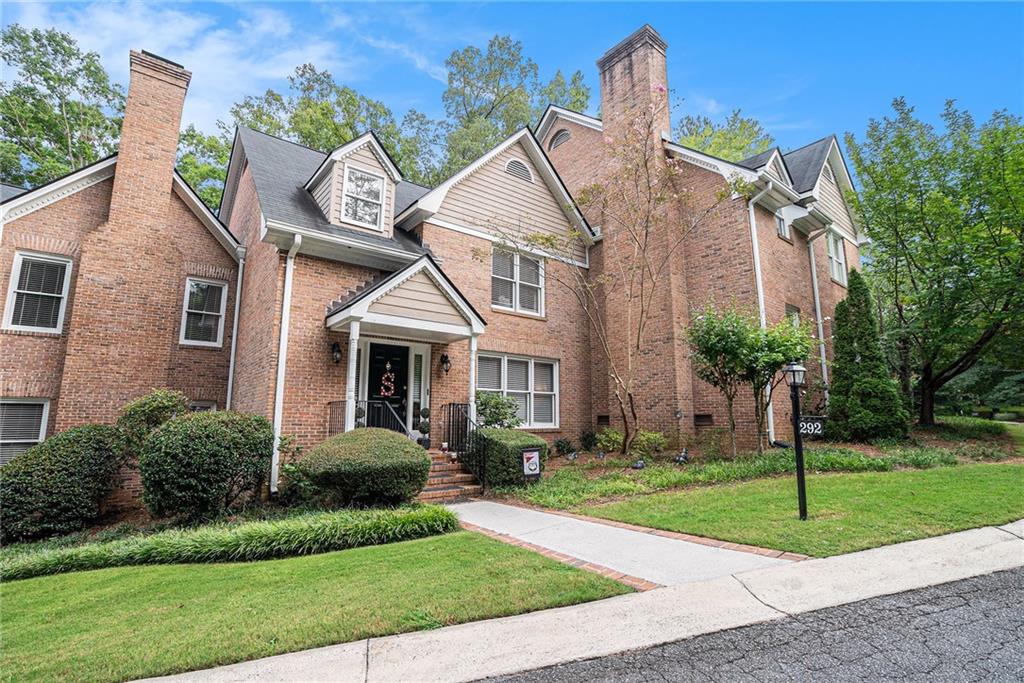 Come check out this home in the Wood Lake neighborhood. The home has a brick exterior with a cozy front porch and a nice wood deck nestled in the shade in the back. There is a small parking lot for residents and guests. The Wood Lake neighborhood has a pool, a lake, and a security gate. Located right off 316, right down from Timothy Road, so it is a short drive to shopping and restaurants in the Oconee Connector area. Walking into the house, you are greeted with a two-story entrance way, neutral paint, and an open floor plan. The living room is spacious with a fireplace and plenty of natural light. The kitchen has Corian countertops and painted cabinets. Off the kitchen is a great space for a breakfast nook or office. The master is on the main level, and a second master and a small bedroom are upstairs. Home has crown molding, updated countertops in the bathroom. These homes don't come on the market often, so don't miss your opportunity to own this beauty. Schedule your showing today.