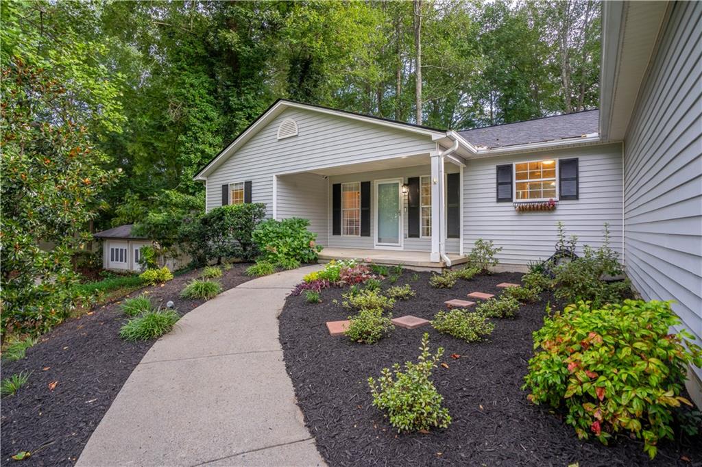 Step into this beautiful 3-bedroom, 2-bath home, nestled in the heart of Hall County. This charming 3-bedroom, 2-bath home offers great space designed for comfortable living and entertaining. As you enter, you'll be greeted by a cozy living area featuring a gas fireplace, perfect for creating a warm and inviting atmosphere on cooler evenings. The home offers a split bedroom plan, providing privacy for the spacious owner's suite. The laundry room is conveniently located right off the two-car garage.
Outside, the fully fenced-in backyard is a true private oasis. Imagine summer nights gathered around the fire pit area or enjoying the charming treehouse. The newly paved driveway and freshly leveled ground add to the home's curb appeal.
This property has been meticulously cared for and updated with significant upgrades that offer peace of mind. The roof is less than one year old, and a brand-new septic system with dual lines provides flexibility and long-term durability. Plus, the HVAC system was recently inspected, and a smart thermostat offers modern convenience. With no HOA or covenants, you have the freedom to truly make this house your home. A home security system with a transferable lease is an added bonus. Don't miss your chance to make this your new home!