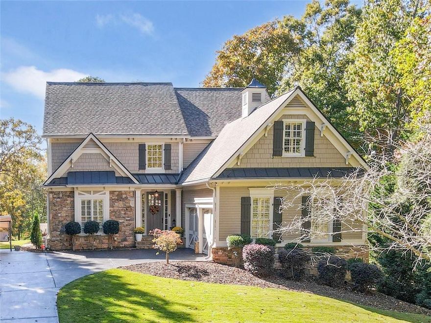 Absolutely immaculate, turn key craftsman on the golf course in the resort-styled community, Chestatee. Hardwoods throughout the main level with chef's kitchen, stainless appliances, gas stove and double oven. Kitchen opens to a warm keeping room featuring a stacked stone fireplace. Open concept living and dining room. Oversized master on main with sitting area. Second master upstairs, perfect for in-laws or teens. Hardwoods and plantation shutters throughout. Huge, covered porch with Trex decking overlooking a private, manicured backyard with panoramic view of fairway. Enclosed golf cart pad under back deck. Full, unfinished daylight basement. This home has too many upgrades to list. It is a must see to fully appreciate what the owners have done.