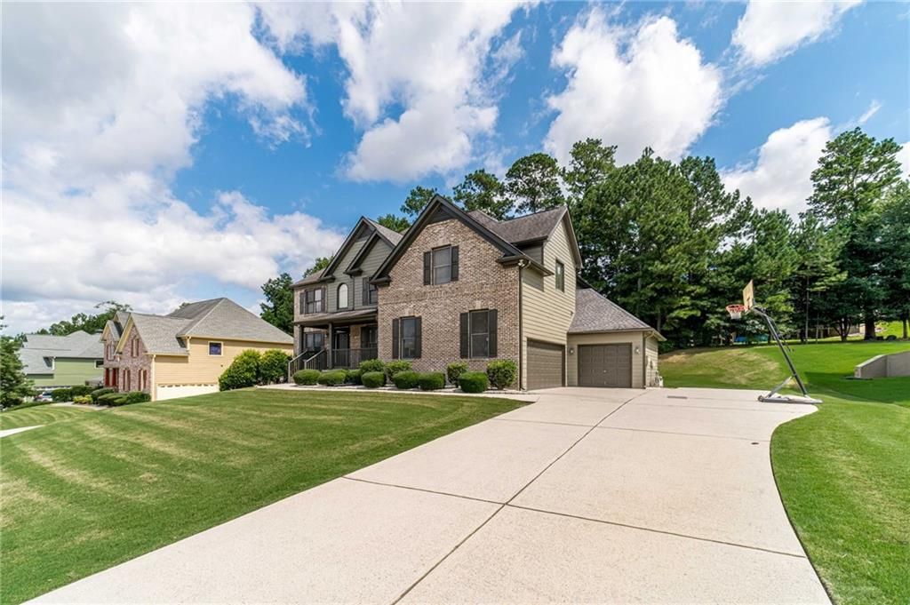 Photo of 1859 Alcovy Shoals Bluff, Lawrenceville, GA 30045 (MLS # 7703956)