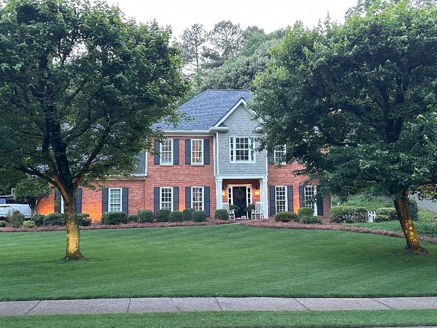 Welcome to this beautifully maintained 5-bedroom, 2.5-bathroom home that blends classic style with modern comfort in the highly sought-after swim/tennis community of West Hampton! Situated on a spacious, flat lot, this home boasts large front and back yards complete with a fully functioning irrigation and sprinkler system. The exterior features classic brick construction with Hardi plank siding, PVC soffit and fascia, double-pane windows, and a brand-new roof installed in November of 2023—offering long-lasting durability and curb appeal.

Inside, you’ll find gorgeous hardwood floors throughout, plush new carpeting on both front and back staircases, and extensive custom trim work that enhances the home’s elegance. The downstairs layout includes a formal living and dining room, a cozy family room, and a sunlit breakfast nook adjacent to the kitchen. The modern kitchen is a chef’s dream, featuring quartz countertops, stainless steel appliances, a deep stainless steel sink, white cabinetry with under and over cabinet lighting, a built-in hall tree with additional cabinetry for storage, and a spacious walk-in pantry.

Upstairs, the home offers five spacious bedrooms, perfect for families or those needing a home office or playroom. The oversized primary suite features a luxurious en-suite bathroom with a soaking tub, double marble vanities, and marble and porcelain tile flooring. A second full bathroom completes the upper level.

Step outside to the fenced backyard oasis, where you’ll enjoy a brick-paved sitting area, flagstone patio, and a charming tree swing—perfect for relaxing or entertaining guests!

Residents of West Hampton enjoy access to a junior Olympic-sized swimming pool, tennis and pickleball courts, and a beautiful clubhouse perfect for neighborhood gatherings and events. It’s a family-friendly, active community that feels like home the moment you arrive. Located in the top-rated school districts of Due West Elementary, McClure Middle, and Harrison High School, this home truly offers the best of comfort, community, and convenience!