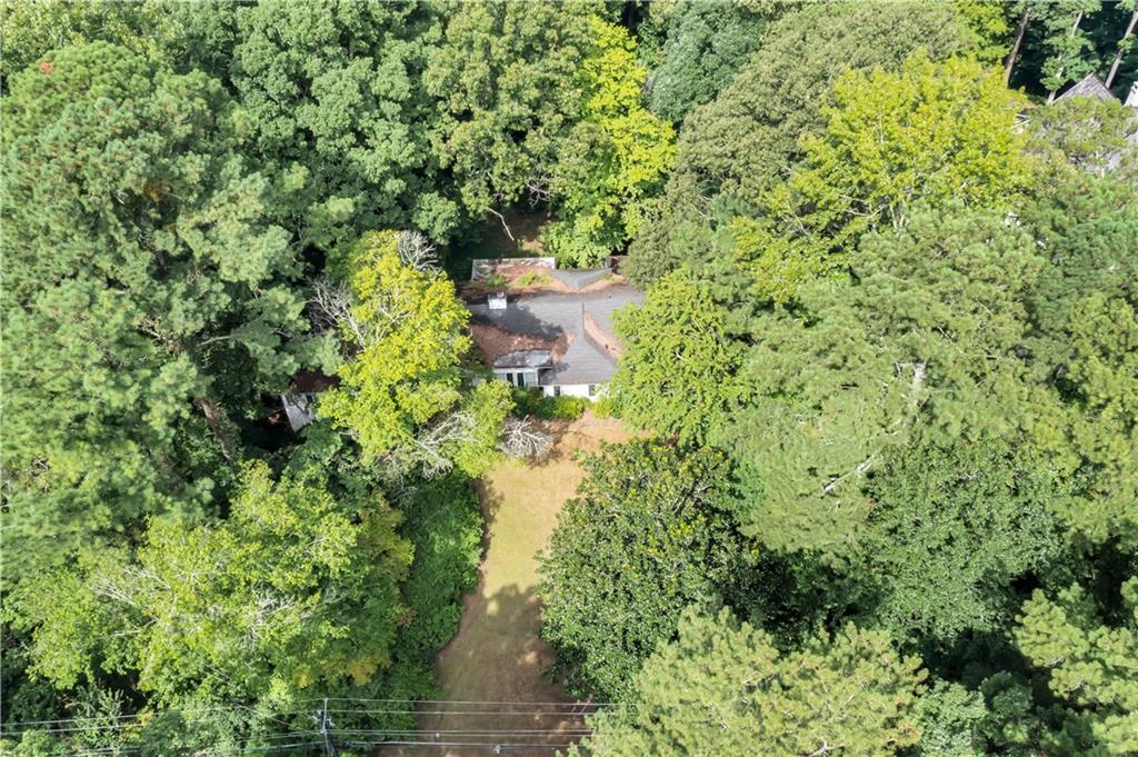 Amazing opportunity to renovate or bring your builder to this 1+/- acre lot in Jackson school district!