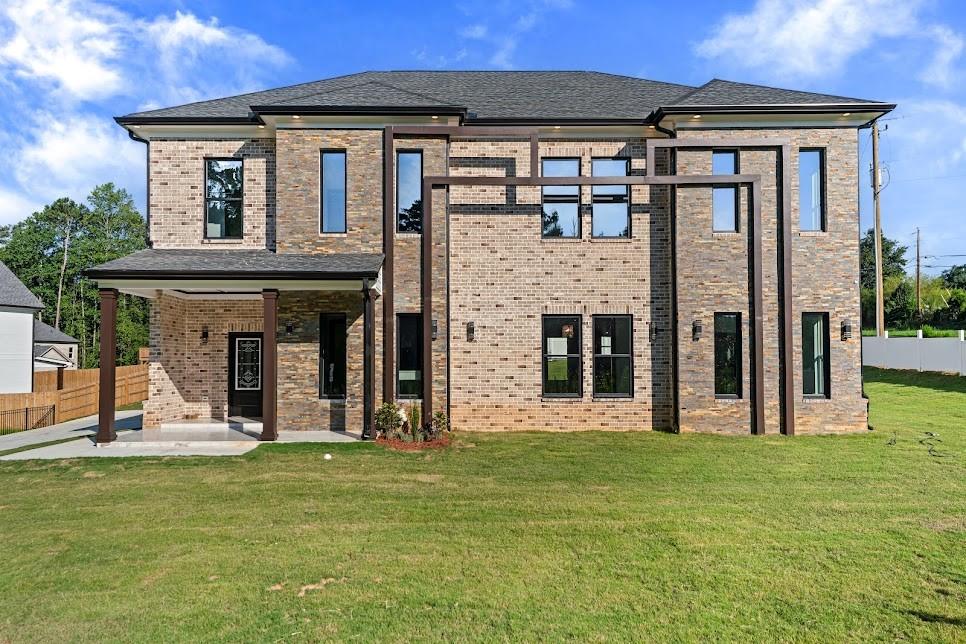 **BUILDER'S and LENDER INCENTIVES AVAILABLE ** Discover the perfect blend of privacy and elegance in this brand-new luxury home at 1515 Grayson Parkway. Nestled outside the
neighborhood but yet not completely secluded, this residence offers the best of both worlds, peaceful living with convenient access to all
that Grayson and Gwinnett County have to offer, all with no HOA restrictions.
The dramatic double-height living room sets the tone with a grand chandelier and a striking fireplace, creating a captivating focal point.
Throughout the home, custom light fixtures and fine detailing add character and charm, while the formal dining room and bedrooms
boast Plaster of Paris ceiling accents that elevate the design to true luxury.
The chef's kitchen is equipped with granite countertops, a built-in wall oven and microwave unit, and a seamless flow into the living and
dining spaces. A main-level bedroom offers flexibility for guests or multi-generational living, while the open second floor overlooks the
living and dining areas, flooding the home with light.
The owner's suite is a retreat of its own, featuring a spa-inspired bath with a rain shower and state-of-the-art fixtures. With tiles
throughout, elegant finishes, and meticulous craftsmanship, this home delivers both sophistication and durability. This residence is not
only a home but a statement of modern luxury, private, connected, and designed to impress.
Offered at $859K, this new luxury residence is thoughtfully priced to reflect both its craftsmanship and today's market, making it an
exceptional opportunity in Grayson.