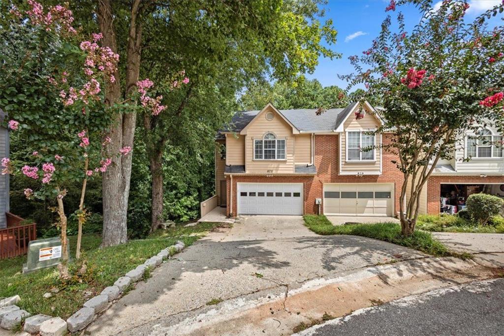 Beautifully updated three-story, end-unit townhouse nestled in a private cul-de-sac with breathtaking views of a serene lake and fountain with a large back deck. This 3-bedroom, 3.5-baths home boasts a finished basement, a 2-car garage, and countless upgrades, the HVAC is two years old, new LVP flooring offering both luxury and comfort. Gorgeous Granite and Trendy Paint Colors. Enjoy Cooking Out on the Back Deck Overlooking the Community Lake. Use the Basement as Extra Suite for Guests, In-Laws or Teens. This community is in Wheeler High School district, known for its acclaimed magnet program - an excellent option for those seeking academic enrichment. Don't miss this rare opportunity - schedule you showing today.