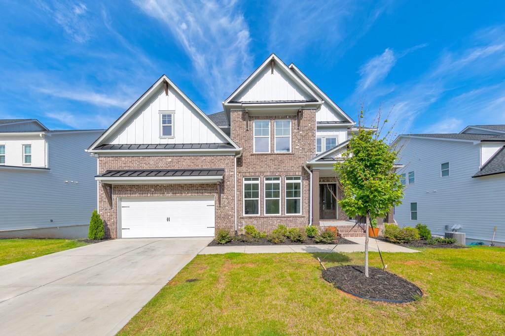 Welcome to this stunning 5 bedroom, 5 bathroom home built in 2024, located in the sought-after Vista Ridge community! A covered front porch welcomes you into a grand two-story foyer. The main level offers an office with French doors, a sunny dining room that flows seamlessly into the modern kitchen featuring a large island with seating, stone countertops, a breakfast room, and abundant cabinet space. The impressive two-story fireside family room is the heart of the home, perfect for relaxing or entertaining. A main-level bedroom and full bath provide a great guest or in-law suite option. Upstairs, the oversized primary suite boasts tray ceilings, a spa-like ensuite bathroom with double vanities, a stunning glass shower, a soaking tub, and a spacious walk-in closet. Three additional secondary bedrooms each feature their own private ensuite bathrooms, and the upper-level laundry room adds convenience. The full unfinished basement with walk-out access offers incredible potential for customization. Enjoy the rear deck overlooking a spacious backyard and the convenience of an attached 2-car garage. Vista Ridge offers fantastic amenities including a community pool, playground, greenspace, and clubhouse. Ideally situated in the highly rated River Ridge High School district, with easy access to Downtown Woodstock’s shopping, dining, and entertainment. This home truly has it all—style, space, and location!