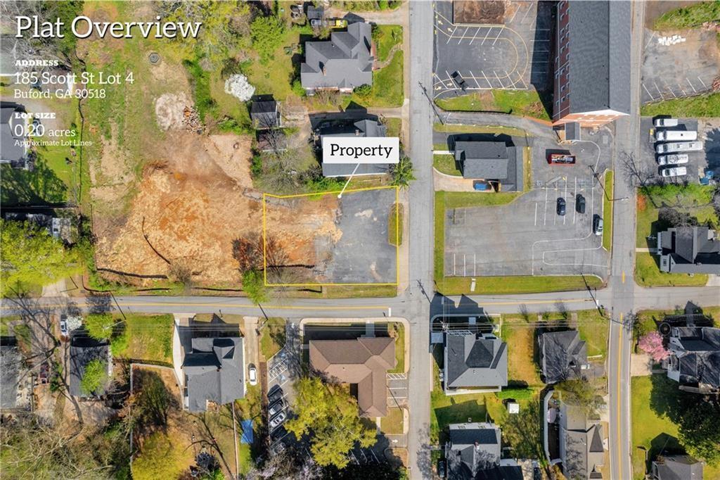 LOT 4/SLAB BUILDING LOT. A RARE FIND! One of the best spots in DOWNTOWN BUFORD! Walking distance to Main Street, the Community Center, School Campus, the Buford Nature Preserve & more. You are steps away from some of the finest restaurants and shops City of Buford has to offer. Indulge in dining experiences like Bare Bones Steakhouse, Aqua Terra Bistro & Ricos Kitchen. SWEEPING CITYSCAPE VIEWS in all directions. AWARD WINNING BUFORD CITY SCHOOL SYSTEM! Minutes to Lake Lanier, I-85 and I-985. Come see this one for yourself because there is a scarcity at all times of anything like it in downtown Buford.