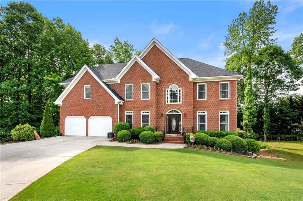 RENEWED LISTING! Buyer financing fell through on this beautiful home, so you now have the opportunity to come see it! Welcome to 370 Fairleaf Court – a beautifully maintained, one-owner 6BR/6BA all-brick home in one of Alpharetta’s most sought-after swim/tennis communities with a vibrant HOA and clubhouse. From the moment you arrive, you'll notice the exceptional care and thoughtful details throughout this spacious residence.
The main level features a large, well-appointed kitchen with white cabinetry, double ovens, wine refrigerator, abundant storage, and gleaming hardwood floors. The kitchen flows seamlessly into an enclosed all-weather patio with Easy Breeze windows, ideal for game days or year-round entertaining. A generously sized bedroom/office with en-suite bath on the main floor offers flexible living.
Upstairs, you'll find oversized bedrooms, each with its own private bathroom, including a grand owner’s suite with a newly renovated spa-like bath. Enjoy easy access to the second floor from dual staircases—front and rear.
The finished terrace level is a true retreat with a wet bar, expansive seating area, beautiful electric fireplace, pool table, workout room, work room, and abundant storage. Step outside to the covered lower deck with under-decking for dry outdoor enjoyment, surrounded by a professionally landscaped backyard that backs up to non-developable lots for added privacy.
Additional features include a 2-car garage, thoughtful storage throughout including a closet under the stairs, and a home designed for comfort, space, and entertaining.
