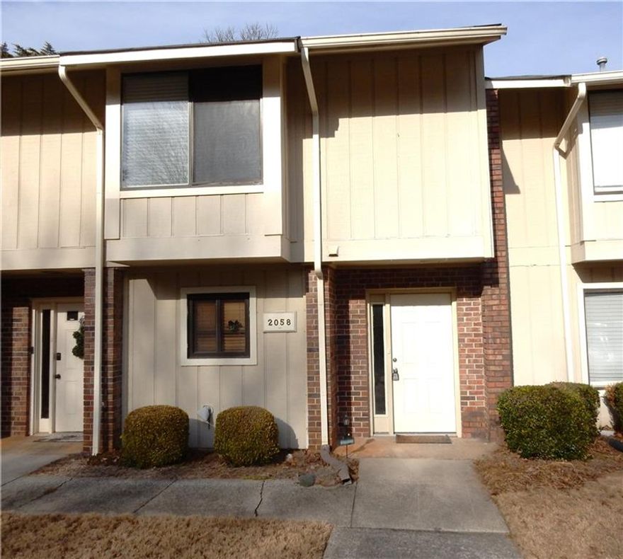 Come see this ready to move-in townhome in the well established, highly sought-after Covered Bridge Community. The convenient location is close to Atlanta with easy access to major highways, Braves stadium and the Battery, shopping and dining venues, plus nearby parks. Highly rated Marietta schools are also a major appeal. Entry foyer leads to the spacious dining room with volume ceiling. The large kitchen is open to the dining room and features stainless steel appliances with tons of counter and cabinet space plus a handy pantry. The large family room features a cozy fireplace and opens to the private enclosed rear porch and patio. Upstairs you will find two primary bedroom suites, each with their own private bathroom and ample closet space. You will enjoy this quiet tucked away community with pool and tennis court. Back on the market due to Buyer's loan falling through. Their loss is your gain!