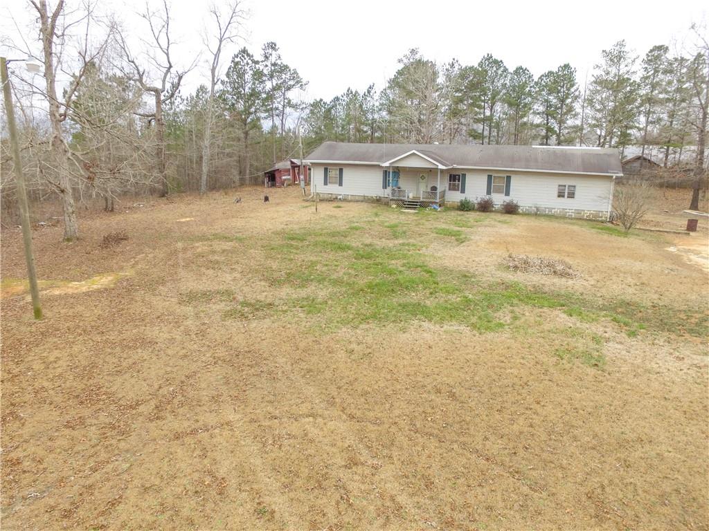 Almost 4 acres (3.64) of beautiful land. Great investment opportunity. Mobile home on property so well water and septic are in place.