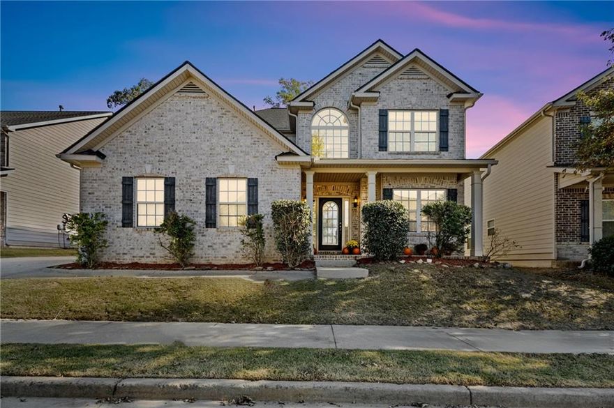 Welcome to this stunning 5-bedroom, 3.5-bath traditional home in the sought-after Cherokee County School District in the heart of Canton, GA.  Step through the two-story foyer and into a home that blends elegance and warmth with timeless charm. Hardwood floors flow throughout most of the main level, leading you past a formal dining room with a coffered ceiling and classic wainscoting.The open-concept layout invites you into the gourmet kitchen, complete with granite countertops, beautifully stained cabinetry, a breakfast bar, and a seamless view to the breakfast nook and cozy family room, with a wall of windows that floods the space with natural light. Step outside to the oversized patio, ideal for morning coffee or evening relaxation. The primary suite on the main level is a true retreat featuring a tray ceiling, plush new carpeting, new paint, and a spa-like ensuite with a garden tub, dual vanities, and a separate walk-in shower, 2 walk in closets as well as a linen closet. Upstairs you'll find brand new carpet, 4 BR's and 2 baths, and a second family room with its own fireplace, the perfect hangout or entertainment space.  You'll love the smart layout upstairs with 2 bedrooms and a full bath on both sides of the family room providing your loved ones and guests a wonderful and inviting living space. With a roof less than five years old and an HVAC system recently serviced by Coolray, this home is move-in ready and built for comfort. Enjoy resort-style amenities including swim, tennis, a playground, and a clubhouse — all within a community celebrated for its hometown charm, top-rated schools, and convenient access to shopping, parks, and restaurants. Don’t miss your chance to call this beautiful Canton home yours today!