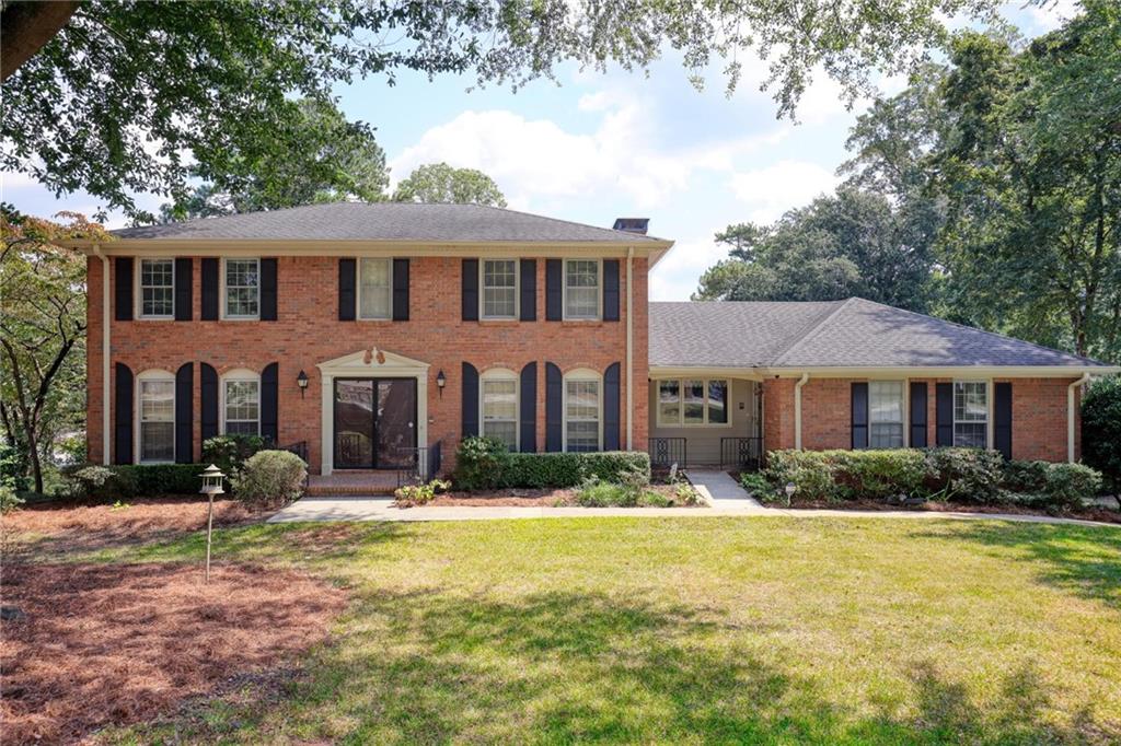 Please schedule to see this custom built, original owner since 1976. Four sided traditional brick home in the prestigious Bennett Woods community. The home showcases classic architectural details from an era that featured solid construction, and timeless design elements. Large windows allowing beautiful natural sunlight to fill the spacious five bedroom home, while the original fixtures and finishes offer a nostalgic touch. The property includes a professionally landscaped yard with fig trees, well established bushes on a beautiful lawn that complements the homes enduring character and inviting ambiance. This home is the very essence of quality construction whether a buyer renovates or if one loves the charm and originality of mid century design.