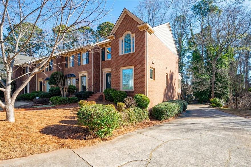 Seller is offering a $5,000 buyer credit for closing costs or rate buydown! Fabulous three story townhome in the heart of Marietta with no HOA! Beautiful light-filled brick end unit with a landscaped front yard and a brick paver walkway. Updated kitchen featuring dark granite counters, stainless steel appliances, new fixtures, and freshly painted cabinetry. Separate dining room with a new chandelier, crown molding, and room for a crowd. Spacious living room with a brick gas fireplace. Charming corner sunroom perfect for a home office or library. New LVP flooring throughout foyer, kitchen, and dining room. New double pane vinyl windows including four picture windows allowing for ample natural light. Upstairs features a large primary bedroom with duel closets, a remodeled bathroom, and an antique vanity. Upstairs secondary bedroom with its own remodeled ensuite. Spacious finished basement with plenty of storage closets and room for a home theatre. Located 1 mile from Kennesaw Mountain National Battlefield Park and only 2 miles to the  Historic Marietta Square. This one truly will not last.