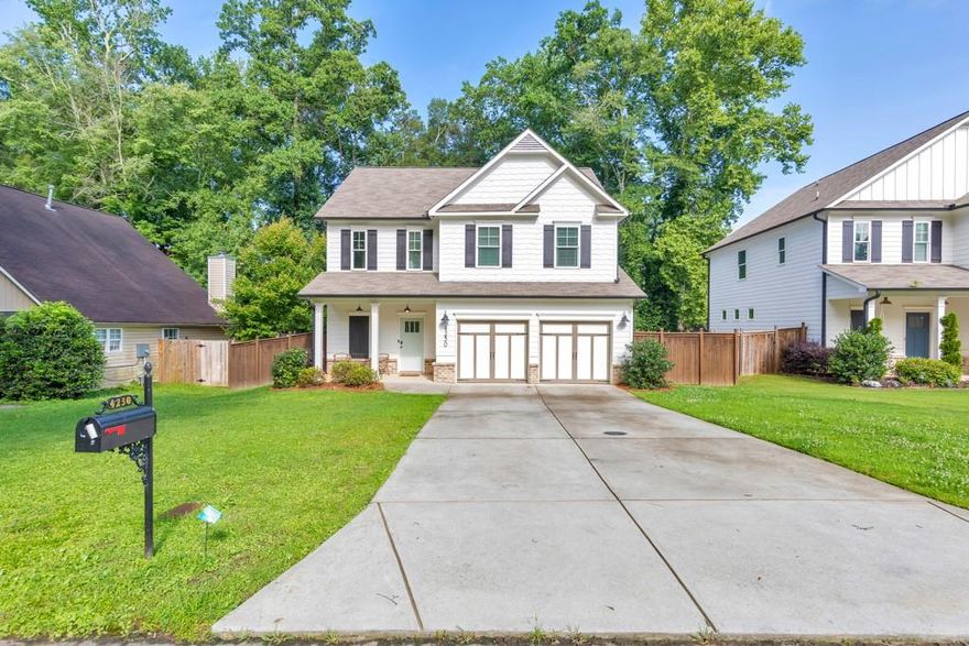 Welcome to this beautiful 4 bedroom, 2.5 bathroom smart home built in 2020—perfectly positioned just a stone’s throw from vibrant Downtown Acworth! Whether you’re looking for a place to call home or an income-producing investment, this property delivers. With a proven track record as a successful Airbnb since 2020, it offers turn-key rental potential and strong income history. Offered at $530K all-inclusive—furniture, silverware, bath towels, and more—this home is ready to start earning you money on day one. A charming front porch sets the tone, inviting you into a thoughtfully designed main level featuring hardwood floors, crown molding, recessed lighting, and custom designer touches. The fireside family room flows seamlessly into the bright kitchen, complete with white cabinetry, quartz countertops, a center island, breakfast room, walk-in pantry, and stainless steel appliances. A convenient half bath completes the main level. Upstairs, the spacious primary suite boasts vaulted ceilings, a walk-in closet, and a luxurious ensuite bathroom with double vanities and a frameless glass shower. Three generously sized secondary bedrooms share a full hall bath, and the upper-level laundry room adds ease to everyday living. Enjoy outdoor relaxation on the rear patio overlooking a private, spacious fenced-in backyard. Additional features include a 2-car attached garage, no HOA, and smart home capabilities. All of this with easy access to I-75, Lake Acworth, and a wide variety of shopping, dining, and entertainment. Don’t miss your chance to own this exceptional home with built-in investment value!