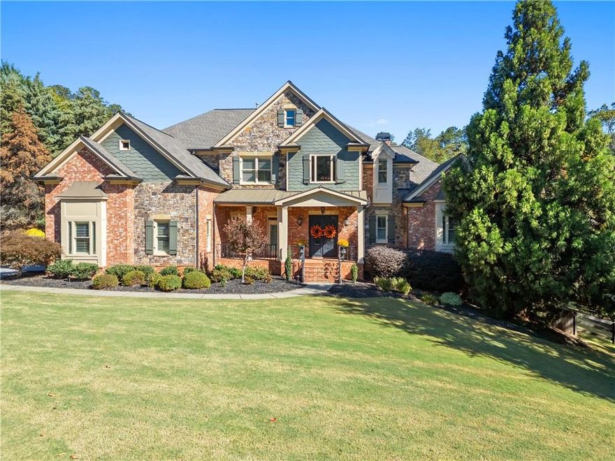 Just a short drive to Lake Lanier, get ready to discover refined living in this gated South Forsyth luxury estate community, ideally located near award-winning schools, shopping, hospitals, and Hwy 400. This stunning custom home offers over 7,600 sq. ft., this 5-bedroom, 5.5-bath all-brick home exudes elegance and comfort. The main level features a designer primary suite, chef’s kitchen, and cathedral-ceiling cozy keeping room. Enjoy year-round outdoor living with a heated saltwater pool, waterfalls, fire bowls, hot tub, and cedar gazebo with fireplace and TV. The terrace level offers endless entertainment value with a full bar, wine cellar with tasting room, home gym, media theater, and guest suite. Enhanced by professional landscaping, new exterior lighting, and a 3-car garage, this exceptional estate combines privacy, sophistication, and convenience just minutes from Lake Lanier.