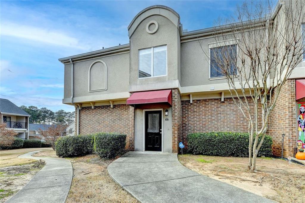 Stunning End Unit Condo with Modern Upgrades and Prime Location! Step into a beautifully renovated space with top-of-the-line finishes and modern aesthetics. Enjoy the convenience of brand-new appliances, making your daily routines a breeze.Benefit from water being included in the HOA fees, simplifying your monthly expenses. Situated in a prime location, this condo offers easy access to major highways and is just minutes away from grocery stores and other amenities.Experience added privacy and natural light with this desirable end unit.