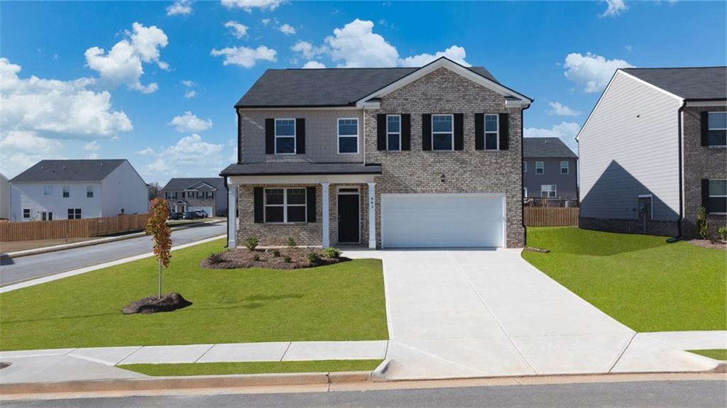 CLOSING COST PAID and special financing with Preferred Lender! Residents will also enjoy POOL, CABANA WITH GRILLING STATION, PLAYGROUND, WALKING TRAILS and DOG PARK! MINUTES FROM I-75 AND I-675. The "HANOVER FLOOR PLAN" offers 4 bedrooms, 3 full bathrooms and a convenient powder room in a two-story home covering 2,816 sq feet. This incredible design opens to an expansive flex room that can accommodate a separate living area and a formal dining space, perfect for entertaining. The island kitchen offers bar stool seating so everyone can stay connected. A casual dining area and vast family room complete the open concept main level. Upstairs features a private bedroom suite with enough space for seating or additional furniture. The spa-like bath features a separate garden tub, shower and dual vanities. Three secondary bedrooms ensure everyone has their own space and include ample storage. Plus, there is a versatile loft that can be personalized as a rec room, chill space for gaming, or the perfect area for family movie nights. And you will never be too far from home with Home Is Connected. Your new home is built with an industry leading suite of smart home products that keep you connected with the people and place you value most. Photos used for illustrative purposes and may not depict actual home.