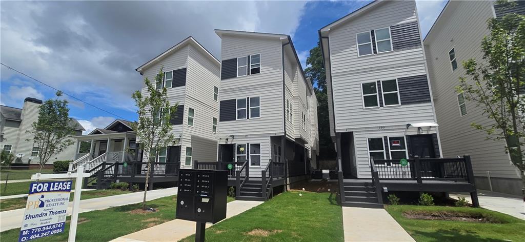 Welcome to this brand new construction duplex in the highly desirable Vine City neighborhood—just 1 mile from Mercedes-Benz Stadium and the Vine City MARTA Station! Designed for modern living, this 3-story home is packed with style, functionality, and convenience.
Interior Features:
First Floor: Features a private bedroom with a full ensuite bath, ideal for a home office, guest suite, or additional lounge space. Private entry adds flexibility and convenience.
Second Floor: The heart of the home shines with a full kitchen complete with stainless steel appliances and a sleek breakfast bar. The open-concept layout also includes a dining area, family room, and a powder room for guests—perfect for entertaining.
Third Floor: Retreat to the spacious primary owner’s suite with a sleek stand-up shower, plus an additional bedroom with its own full bath—offering privacy and comfort for all residents.
Exterior & Bonus Features:
Each unit includes a private porch—ideal for relaxing mornings or winding down in the evening. The rear unit has easy access via a side breezeway. Ample parking options include on-street and dedicated rear parking. Modern living meets sustainability with an EV hookup for each unit in the rear.
Live within walking distance of everything downtown Atlanta has to offer. With close proximity to public transit, major attractions, and a neighborhood on the rise, this is an incredible opportunity in Vine City. Now available for move-in by Aug 15—don’t miss out!