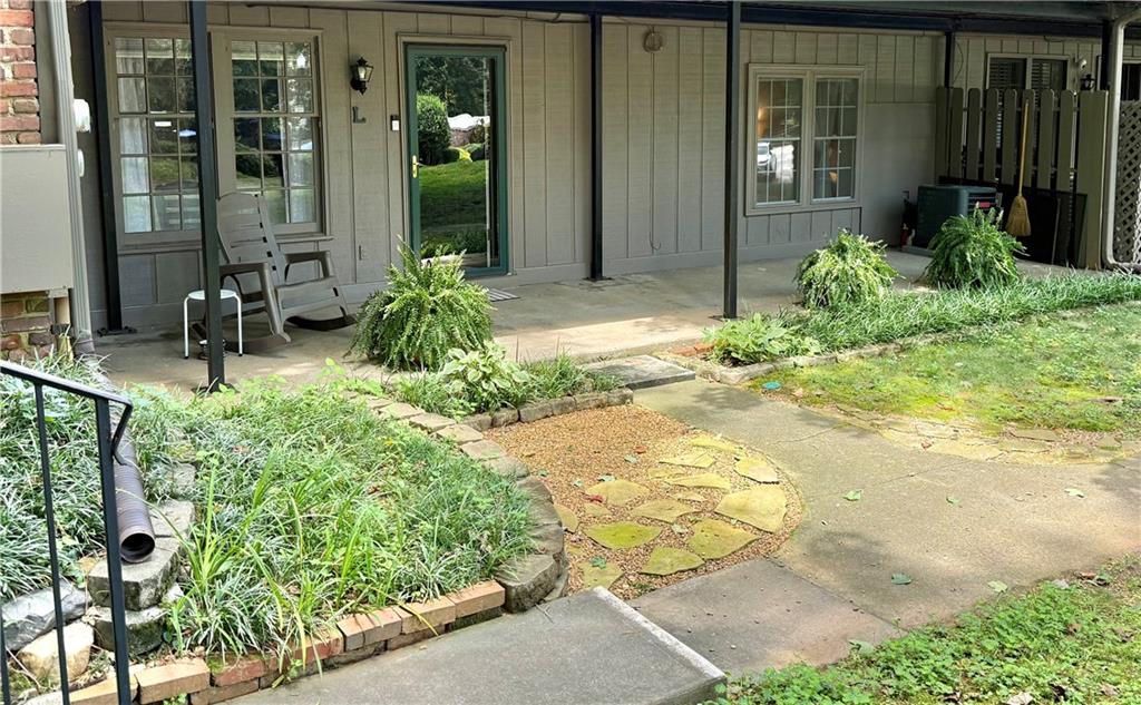 Pristine and move in ready condo in great central location in sought after Lakeside School District! This 1 bedroom/1bath condo is perfect for a first time homebuyer or an investor looking for a great rental property. First floor walkout home, with a beautiful covered patio with view of the parklike grounds. Hardwood floors throughout home and updated tile bath. No carpet in sight! Amenities include an Olympic-sized swimming pool, tennis and basketball courts, a playground, abundant greenspace with plenty of space for dog walking or for kids' playtime, a fitness center, and a clubhouse. Low HOA monthly fees cover water, sewer, insurance, pest control, reserve funds, trash, termite control, and all available amenities! The only rental restriction is that all leases must be six months or longer. There are no rental caps or other restrictions. The location is ideal, very close to I-85/285, Mercer University, MARTA station, Midtown, Emory, CDC, Georgia State University, the North Dekalb Senior Center is Chamblee, shopping, restaurants, and so much more!