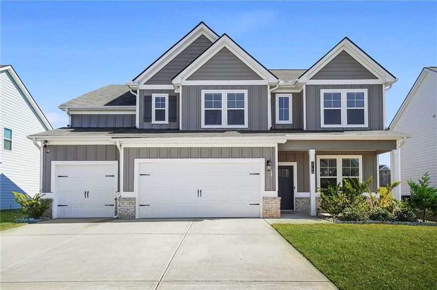 This elegant 5-bedroom, 3-bath home welcomes you with a grand foyer featuring luxury vinyl flooring throughout the main level. The formal dining room boasts a coffered ceiling, crown molding, and beautiful shadowbox trim, creating a warm and sophisticated atmosphere. The spacious family room offers an electric fireplace—perfect for relaxing or entertaining guests. The chef-inspired kitchen is a true highlight, featuring quartz countertops, ample cabinetry, stainless steel appliances, and double ovens. A large secondary bedroom and full bathroom on the main level provide comfort and convenience for guests or multi-generational living. Upstairs, you’ll find three generous secondary bedrooms and a luxurious owner’s suite with a spacious bedroom, dual vanities, and a separate ceramic-tiled shower. A 3-car garage completes this impressive home, offering both functionality and style.