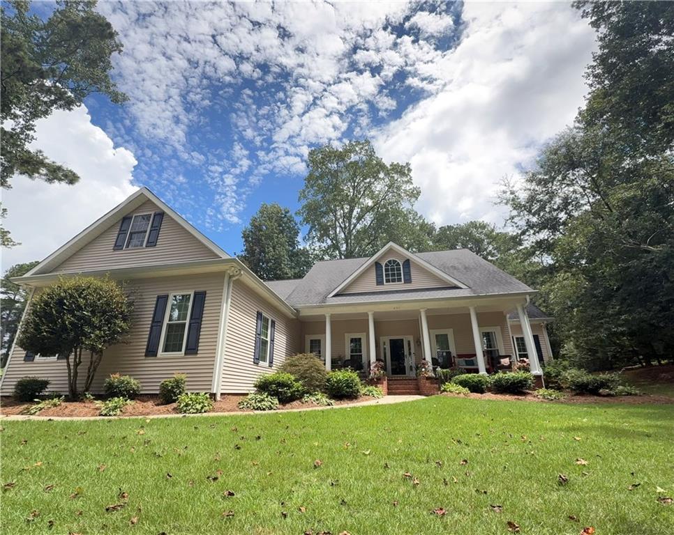 Looking for a ranch-style home with private access to Lake Carroll, in the City Limits of Carrollton? This traditional 3BR/2.5BA home has a rocking chair front porch with lake views, an expansive deck for outdoor entertaining, a fenced-in backyard with an outbuilding, and a shared easement for private lake access. The home has an open foyer to the living area with a split bedroom plan, granite countertops and stainless steel appliances in the kitchen, and a finished staircase to an unfinished, framed, expandable attic space. Close access to the greenbelt, Lake Carroll Pavilion, the new pickleball courts, shopping, and schools.