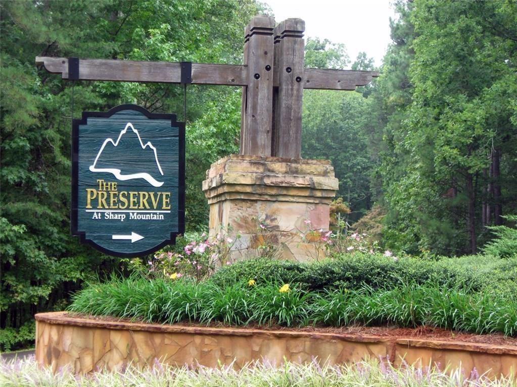 Build Your Dream Mountain Home with Spectacular Views in Jasper, Georgia
Are you searching for the perfect private retreat to build your mountain dream home? Look no further than this serene 4.52-acre lot, offering unparalleled opportunities to enjoy nature and breathtaking vistas.
Nestled at an elevation of nearly 1,900 feet, this gently sloping lot is ideal for a basement home and features majestic, towering oaks lining the sides and back of the property. The lot boasts stunning long-range mountain views from the rear and enchanting panoramas on the right side, providing picturesque settings for both sunrise and sunset.
The terrain slopes beautifully, making it perfect for exploration on foot or creating switchback trails for four-wheelers. Whether you're seeking adventure or tranquility, this lot delivers.
The peaceful community offers an array of amenities to enhance your lifestyle:
Hiking trails that wind through lush, wooded landscapes.
Parks and picnic areas, including gazebos and a spacious pavilion perfect for family gatherings.
Creeks and natural beauty that invite relaxation and connection with nature.
This hidden gem is conveniently located just minutes from hospitals, shopping centers, and the charming downtown Jasper area, where you'll find local restaurants, boutiques, and year-round community events.
Now is your chance to make it your own and build a home where you can enjoy mountain breezes, starry nights, and the best of what Jasper, Georgia, has to offer.
Don't just take our word for it—visit the community and speak with the friendly residents who will tell you why they love living here.
Act quickly—this unique opportunity won’t last long!