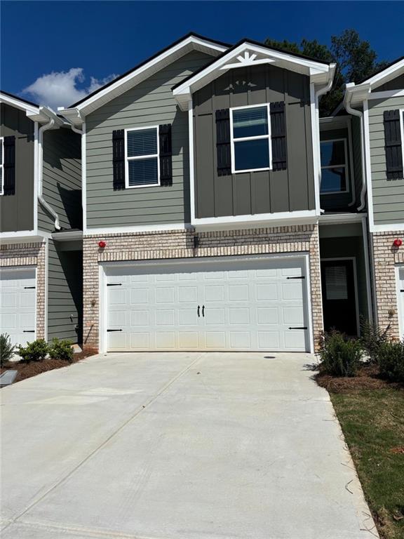 A thoughtfully designed plan with stylish, high-end finishes throughout. Modern kitchen with seamless flow to dining and living area. Cozy FP, recessed lighting, 9' ceiling on main. Relaxing owner's retreat, sitting area, spa bath, granite tops, vessel sinks. soaking tub. Two additional BR's, security system, keyless entry, app controlled lighting and thermostat. EV-ready garage! Small community -- 47 Townhomes!