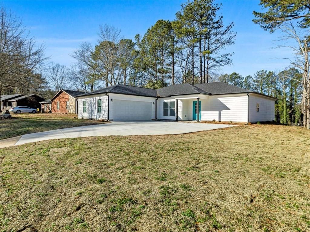 Photo of 7227 Ginger Ct Ct, Riverdale, GA 30296 (MLS # 7705220)