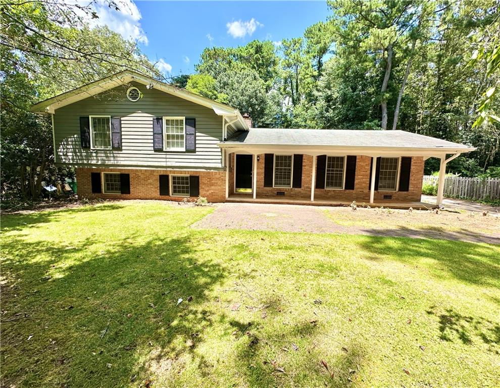 Welcome home to this solid 5-bedroom, 3-bathroom split-level gem in the heart of Stone Mountain! Nestled on a quiet street, this home offers the perfect blend of space, comfort, and convenience for today’s modern lifestyle.
Step inside to find a light-filled living room that flows seamlessly into the dining area and an updated kitchen — perfect for entertaining. The upper level features 3 generously sized bedrooms, including a primary suite with a private bath, while the lower level offers 2 additional bedrooms, a full bathroom, and a cozy family room — ideal for guests, a home office, or multi-generational living.
Enjoy outdoor living in your huge backyard, perfect for family gatherings, gardening, or creating your own private oasis. The property also includes a spacious driveway and plenty of room for parking.
Located just minutes from parks, shopping, dining, and easy access to I-285, home is a must-see!
