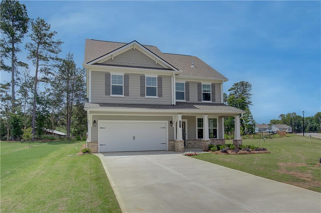Introducing the stunning Devon Plan wihtin the luxurious Cooper Park Community of McDonough, GA. This 5 bedroom, 3.5 bath stunning property offers an open concept  kitchen with quartz countertops, stainless steel appliances (refigerator not included) and stylish backsplash. The gorgeous kitchen opens to the family room which is made for entertaining. The primary bedroom is oversized and the primary bathroom features a tile shower and floors and all bathrooms boast solid surface countertops. Come explore the new to the area plan and experience upscale living? Close to Interstate 75 and a plethora of shopping and dining. In the sought after Dutchtown School District. The community has a cabana, swimming pool, playground, dog park, and walking trail. *Stock Photo (not the actual house)