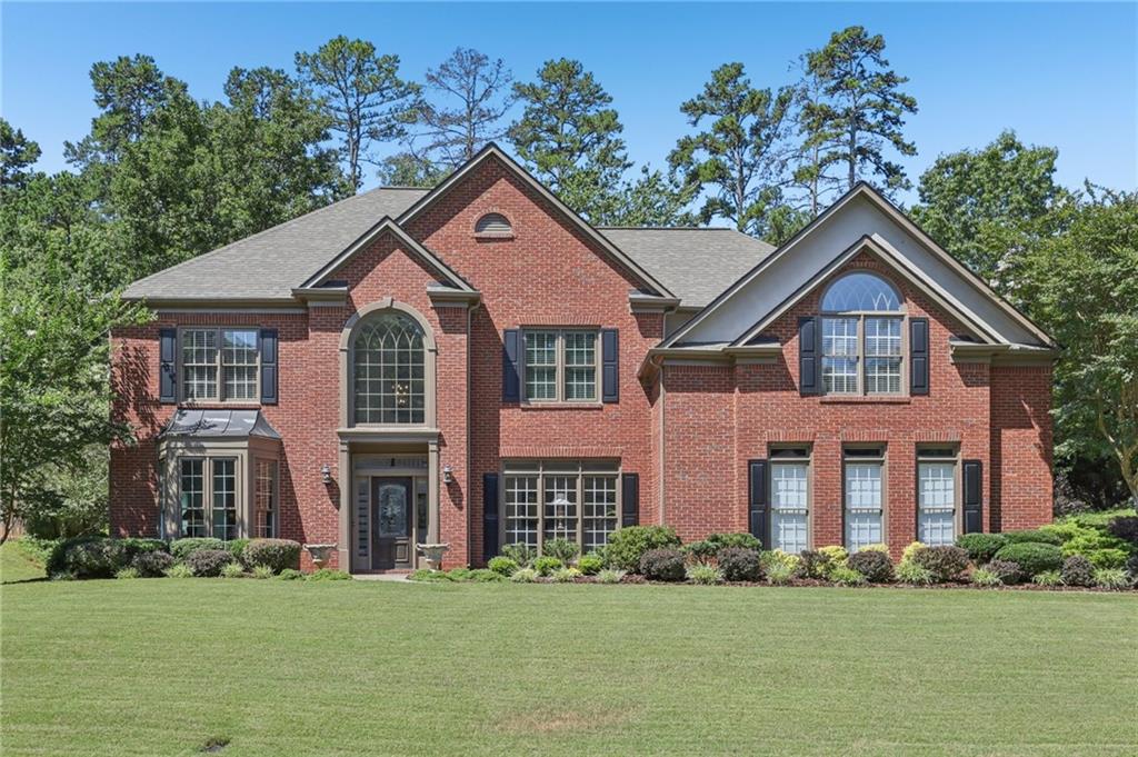 ELEGANT 3-SIDES BRICK HOME in the prestigious OLDEBRANCH section of the sought after MORNINGVIEW community with TOP-RATED NORTH GWINNETT SCHOOLS and UNMATCHED AMENITIES! This ORIGINAL OWNER home sits on one of the LARGEST
FLOOR PLANS in the neighborhood, boasting over 4,100 square feet of beautifully updated
living space, including a massive 3-car garage (800+ sq ft) with room for vehicles, storage, golf
cart, or workshop! Close to $100K IN UPDATES AND UPGRADES over the past 6 years,
including a new roof (2019), new floors, and a completely renovated kitchen. Nestled on a
private lot, this residence features fresh white paint throughout the main level and newly
installed engineered hardwood floors that flow seamlessly throughout the entire main and much
of the upper level. The chef’s kitchen showcases stunning high-end Calacatta Royale QUARTZ
COUNTERTOPS, an oversized mahogany island, SOFT-CLOSE CABINETRY, and a FULLY
UPDATED APPLIANCE PACKAGE, including double wall ovens, 5-burner gas downdraft
cooktop, brand new refrigerator (2025), and beverage cooler. Upstairs, you'll find four oversized
bedrooms, including an oversized owner’s suite with a jacuzzi soaking tub, separate vanities, and
a huge walk-in closet with his and her sides. A versatile loft area upstairs offers the perfect flex
space for a home office or reading nook. Located in the highly desirable MorningView
community, amenities include a clubhouse, three pools (including a splash pad and water slide),
newly resurfaced tennis and pickleball courts, playground, and an active HOA. Enjoy 10+ miles
of walking/biking nature trails, all accessed from the trailhead across the street from the
clubhouse, just a half-mile walk from George Pierce Park, and a scenic 2.5-mile walk or bike
ride to Suwanee Town Center, the library, Saturday farmers market, ice cream shops, coffee
houses, and a variety of unique dining options. This home has been meticulously maintained and
thoughtfully improved—perfect for the discerning buyer seeking luxury, lifestyle, and
LOCATION! Showings are by APPOINTMENT ONLY beginning Friday (25th), and the OPEN
HOUSE is on Saturday (26th) from 12-2.