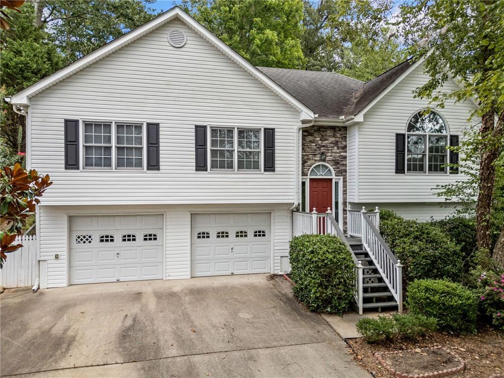Location Location Location! Beautifully secluded family-friendly neighborhood just seconds from Premier Canton Marketplace shopping/restaurants/& highway access. Quick commute to Jasper/Cumming/Cartersville/Roswell. Corner lot boasts of mature trees and shaded patio space - great place to enjoy a quiet cup of coffee. 3BD/3BA Ranch on basement. Entry foyer with a few stairs walk up to main level. Vaulted ceilings & Cozy fireplace in the Living Room, open sight lines to Breakfast Room. Kitchen includes ample cabinetry & counter space including island for prep. Separate Dining Room in Rear could easily be used as keeping/second living room or playroom. Master Suite on main featured trey ceilings, walk in closet + en suite 5 piece BA. 2 additional BD/1 Full BA on main. Basement includes partially finished space w/ Full BA. 2 car Drive under garage.