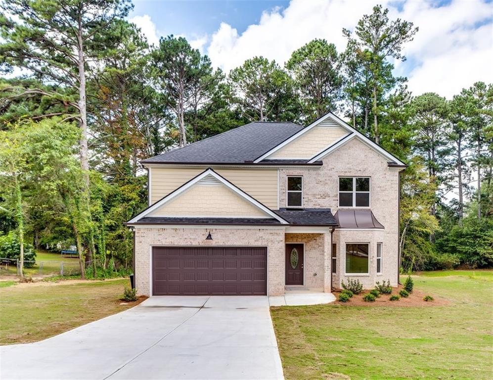 Welcome Home to this stunning new construction home offering the perfect blend of comfort and style. Featuring 3 spacious bedrooms with a versatile bonus room that can easily serve as a 4th bedroom, this residence boasts 2.5 bathrooms and a thoughtfully designed floorplan for modern living. The open family room flows into the gourmet kitchen with granite countertops, stainless steel appliances, and 42" cabinets, while the formal living and dining rooms add the perfect touch of elegance. Upstairs, you'll find generously sized bedrooms, a luxurious owner's suite with walk-in closet and spa-like bath, plus a convenient laundry room. Enjoy the outdoors with a spacious backyard and a long driveway offering ample parking. This home combines modern finishes with practical spaces, making it the ideal place to call home. Enjoy the community lake for serenity. Nearby shopping and restaurants and easy access to I-20.