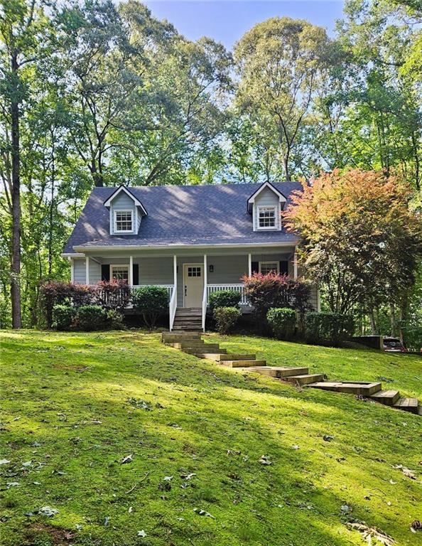 Convenience meets serenity at the end of a quiet cul-de-sac, offering lush green views from every window in this peaceful, private setting that’s just minutes from schools, shopping, dining, and childcare.
Charming 3-bedroom, 2.5-bath home with a finished basement flex space that's perfect for an office, playroom, or creative studio. Real hardwood floors throughout the main living areas, adorable farmhouse kitchen with soft close cabinets and custom pullouts, private primary suite with generous closet space. Real wood cabinets in a full garage workshop. NEW ROOF, recently replaced water heater, washer/dryer, refrigerator. Set on a spacious 0.58-acre lot, with a level driveway, the backyard is a hidden gem. A gentle creek winds through the rear of the property, providing a tranquil setting for the firepit area—perfect for cozy evenings and casual gatherings. A lush, easy-care moss lawn adds to the natural charm and keeps maintenance simple. There’s also plenty of space to garden, play, or enjoy the view from the porch swing.
NO HOA - no restrictions in this well-maintained community.