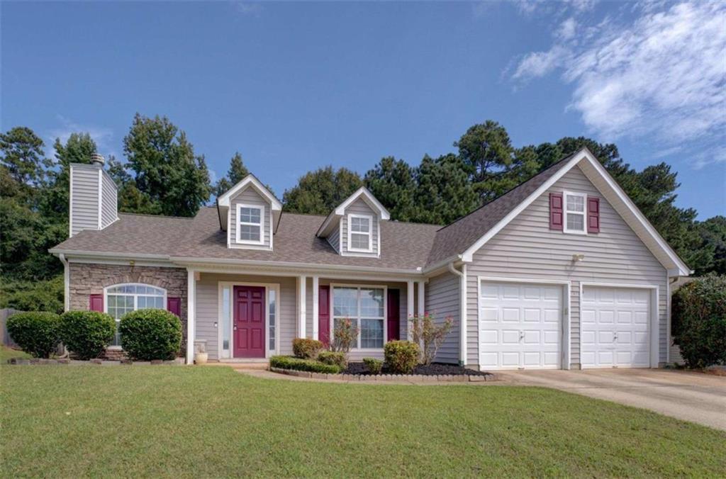 Charming 3BR/2BA Ranch with great features inside and out! This home offers a vaulted living room with open sight-lines to the kitchen, perfect for everyday living and entertaining. Enjoy outdoor living on the covered front porch or relax on the covered back patio overlooking the fenced yard with garden space. The owner's suite includes a private bath, while two additional bedrooms and a full hall bath provide flexibility. A 2-car garage adds convenience and storage. Move-in ready, freshly painted interior, professionally cleaned, and refreshed landscaping- don't miss this one!