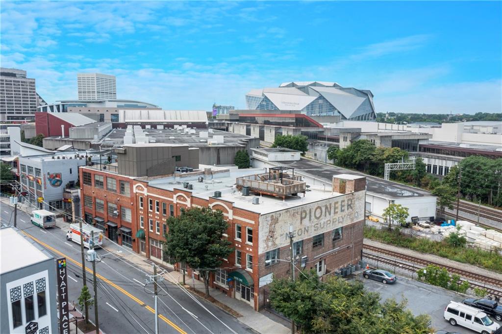 One of a kind, charming condo in the heart of Downtown Atlanta. This industrial loft boasts high ceilings, tons of natural light, exposed bricks, built-in bookcases, swing & hardwoods throughout. This spacious open floor plan connects SS appliances & white cabinet kitchen to oversized living room & formal dining room. Bonus space off living makes for perfect office or bedroom. Upstairs overlooks main floor below & features loft bedroom space + landing, massive walk-in shower & walk-in closet. Enjoy the best Downtown has to offer. Walkability to tons of restaurants, downtown attractions, & Centennial Park. This loft is minutes to Georgia Tech, West Midtown & Westside Provisions District. 1 dedicated parking spot in gated building lot. All appliances stay & included in the rent. Tenant pays $75 utility fee to cover water, sewer, & trash. Tenant covers all other utilities needed. Pets ok with $250 pet deposit & pet fee $35/mo. Check out the 3D Tour and schedule a showing today!