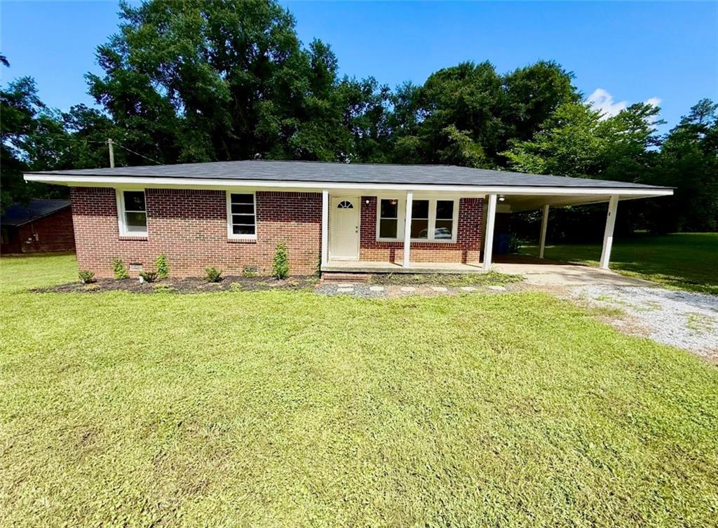 Welcome to this beautifully updated 3BR/1BA all-brick ranch situated on a spacious, private lot with no HOA. This move-in ready home blends classic charm with thoughtful modern updates, including:New Roof, Luxury Flooring Throughout, Updated Electrical & Plumbing, with a Gas Furnace. The interior features a functional, open layout with durable and stylish finishes. The exterior offers ample outdoor space for gardening, pets, entertaining, or future expansion. Enjoy peaceful country living with the flexibility to use your land your way with no subdivision restrictions. Conveniently located just minutes from Jackson Lake, and a short drive for shopping, dining, parks, and schools, this property provides the perfect mix of privacy and accessibility. Don't miss this rare opportunity, schedule your private tour today.