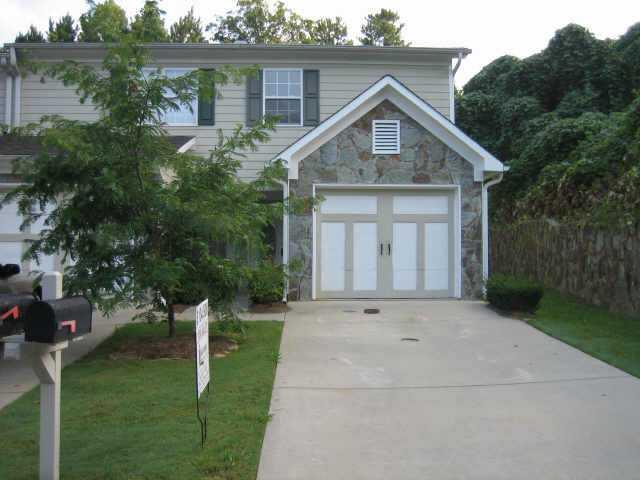 Wow! Amazing value here in the quaint community of 14 homes! Very private setting away from it all. Sqeaky clean - new paint/carpet, clean appliances - move in condition! Storage in garage too. Open plan on main level and pretty fireplace with builtin entertainment center above.