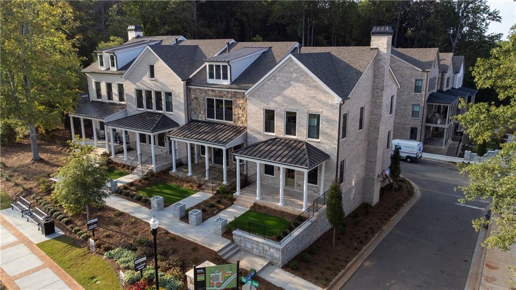THE FINAL HARLEIGH BASEMENT IS MOVE IN READY! Don't miss out on the last opportunity to purchase this beautiful STONE ELEVATION with the ability to walk right in on your main level to Thompson Street as you come home from a nice stroll in Downtown Alpharetta or shopping/dining at Avalon!
Luxury is in every detail with Empire’s newest community located in one of downtown Alpharetta’s most prestigious addresses. Just steps from Avalon and a quick walk from the heart of downtown, in connection with the Alpha Loop, Empire Chiswick’s four districts impart an old-world feel and reflect a regal period of classic brick architecture. With shops, restaurants, and entertainment options all at your door, Chiswick is the sweet spot between historic charm and modern living, appealing to everyone no matter what stage of life they’re in. Much like the London district it’s inspired and named after, here is where the tranquility of the suburbs meets the energy of Atlanta’s urban core. Revel in semi-private courtyards and formal gardens when you own one of these 43 luxurious English-style 3- and 4-bedroom townhomes. The Harleigh plan features amazing details with an abundance of space. This ELEVATOR READY home opens its doors for so much creativity! The first floor features a Rec Room perfect for an office or in-law suite with a full bath. The main floor features a spacious family room with fireplace opening out to your front covered porch overlooking greenspace, an oversized island large enough to serve as a buffet, a chef’s kitchen with high end stainless steel appliances, 42” stained/painted cabinets featuring soft close doors/drawers, walk in pantry that’s alongside the butler’s pantry, the dining room is perfect for your oversized dining table, and a tech area perfect for your drop off station. The 3rd floor features a generous Primary Suite with a large walk in custom designed closet, a spacious bathroom with luxury tiles, large walk in shower with bench and a lavish soaking tub. There is a laundry room and 2 secondary bedrooms that share a full bath. READY NOW! This community is SHOWN BY AN EXCLUSIVE APPOINTMENT ONLY. CALL TODAY TO SCHEDULE AN APPOINTMENT.