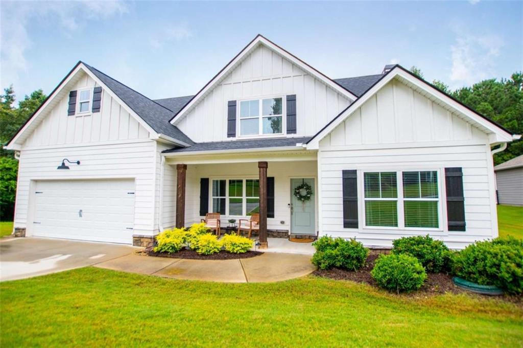 Like new stunner in Bremen City minutes from award winning schools! Total electric, low maintenance hardiboard, owners suite on the main plus an additional bedroom and full bath, 2 additional bedrooms, full bath, and bonus room upstairs, quartz countertops, and stylish finished throughout. Oversized bedrooms with exceptional closet storage. Covered back patio overlooking such a beautiful, fenced back yard. Spray foam insulation, zoned HVAC. Great subdivision with fun times to be had at the neighborhood pool.
