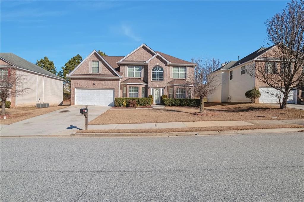 This is your chance to own this spacious, well-maintained family home in a friendly, beautifully-landscaped neighborhood. A blend of tranquility and convenience just minutes from downtown City of Conyers, which offers restaurants and shopping, minutes from Interstate 20. Inside offers you the space you need in each room. Large formal dining room. Formal living room. Eat-in Kitchen overlooking Greatroom with space for large gatherings. Enjoy the warmth of the master suite, which offers separate shower and soaking tub, double vanity, walk-in closet and high trey ceiling, which makes for an open feel. All other 4 bedrooms are oversized. New roof was installed in 2021. Thanks for showing!