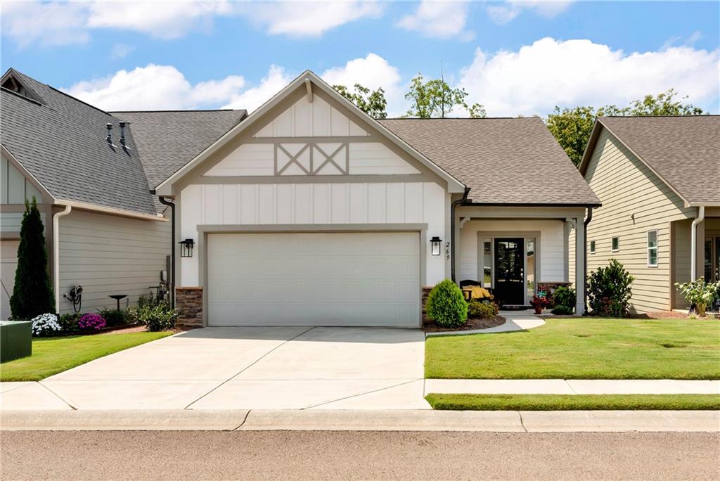 Beautiful ranch home in a highly sought-after 55+ community offering comfort, convenience, and endless potential. Main level features 2 bedrooms and 2 baths including an owner’s suite with double vanity and tile shower, plus an additional bedroom and full bath. The open layout connects the living, dining, and kitchen areas seamlessly, with solid-surface counters, stainless steel appliances, gas range with vent hood, and island seating. The full basement is plumbed and ready for a bath and small kitchen, providing opportunity to add extra bedrooms, a guest suite, or a private apartment to suit your needs. Enjoy privacy with wooded views from the back of the home while taking advantage of the active community lifestyle that includes sidewalks, streetlights, pickleball, weekly card games, book club, pool volleyball, and clubhouse activities. HOA dues cover basic cable, Wi-Fi, trash, and lawn maintenance. Conveniently located just 1.1 miles from Piedmont Mountainside Hospital and 3 miles from Publix.