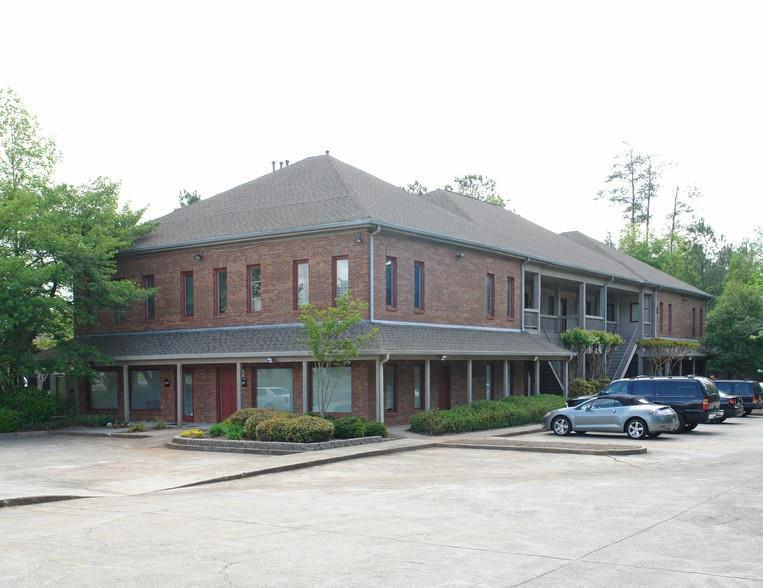 Ground floor 980 sq ft. unit available for sale or lease. This suite provides six offices, including an oversized reception office with a large closet, as well as a spacious reception/waiting area, a kitchenette, wet bar and restroom. It boasts newly installed ceramic plank tile in the main common areas and two back offices with carpet in remaining offices. High-speed cable internet (Charter Cable) and television cable wiring pre-installed. Featuring plentiful drive-up parking, it is conveniently located in Roswell just off Holcomb Bridge Road near GA 400 in a high volume commercial area with monument signage available. Call today to schedule your viewing!