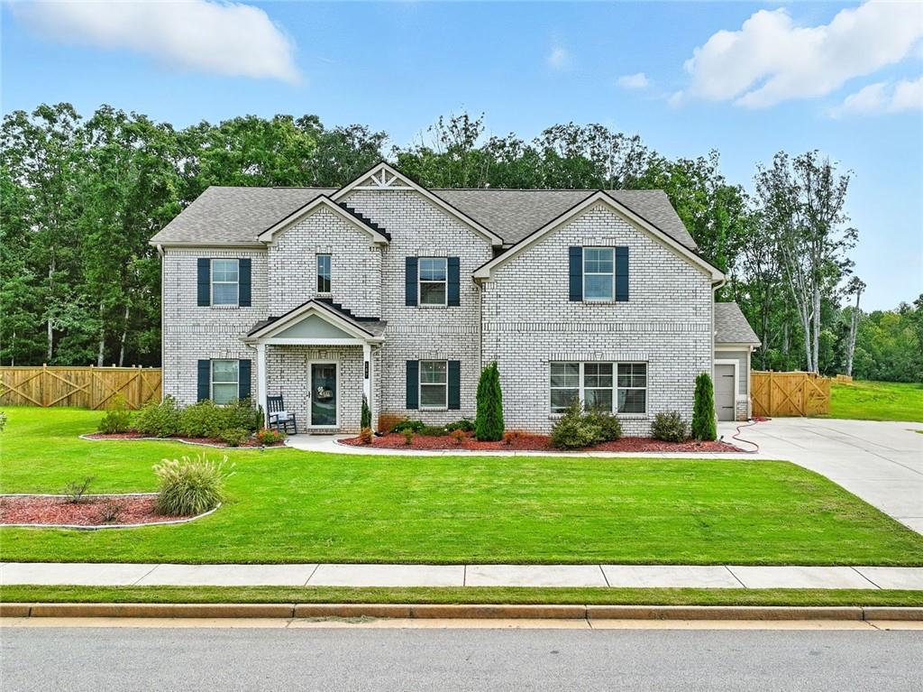 Welcome to refined Southern living in this beautifully built 3-year-old brick home, perfectly situated in a secure, gated community. Boasting 5 spacious bedrooms and 4 full bathrooms—including two lavish owner’s suites—this home offers comfort, style, and flexibility for modern living.
The versatile bonus room can easily serve as a 6th bedroom, home office, gym, playroom, or guest retreat—tailored to your lifestyle. Step into the gourmet kitchen featuring granite countertops, stainless steel appliances, a walk-in pantry, and designer cabinetry—all flowing into an open-concept living space designed for entertaining.
Outside, enjoy the upscale ambiance created by recessed lighting around the entire exterior, enhancing curb appeal and evening elegance. The private backyard is a true retreat with a custom fire pit, charming gazebo, and plenty of space to unwind or entertain. A 3-car garage offers generous storage and parking.
This home delivers luxury, practicality, and presence—all in one of the area’s most desirable neighborhoods. Schedule your private tour today!