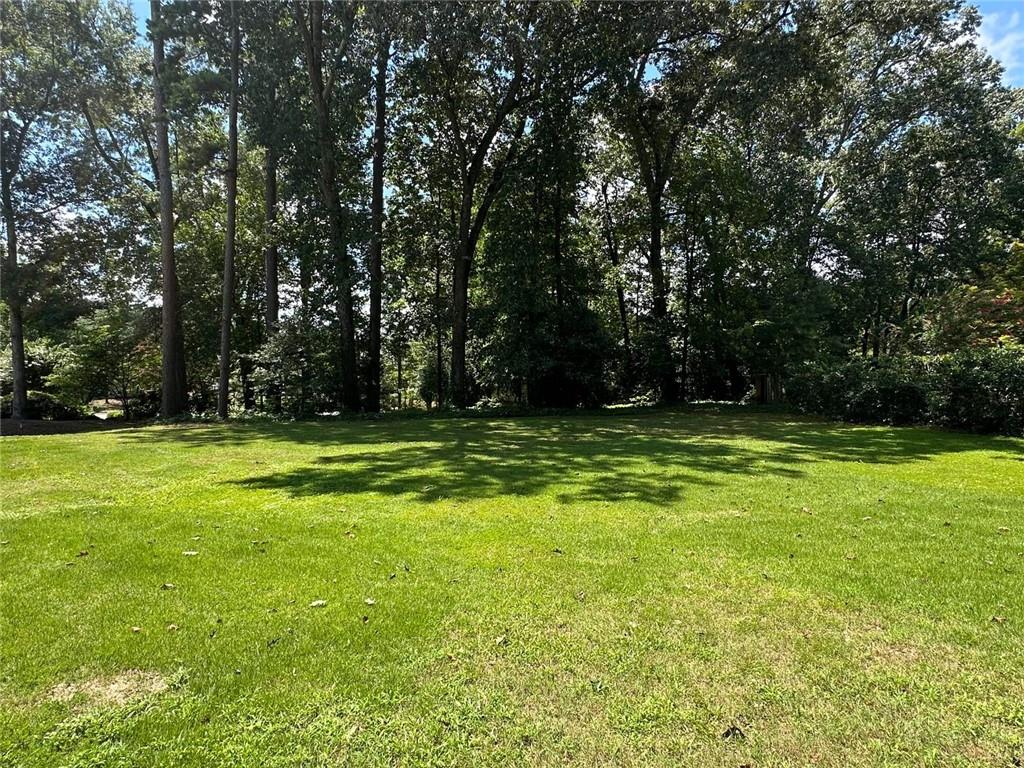 Absolutely gorgeous .86 acre lot one of the most beautiful streets in Atlanta Country Club in East Cobb. One of the last opportunities to build in heavily sought out Atlanta Country Club neighborhood. Build your dream home on this large level lot in one of metro Atlanta's premier golf cart communities. Boundary survey will be available next week. To walk the property, please call or text Sheri Hardy.