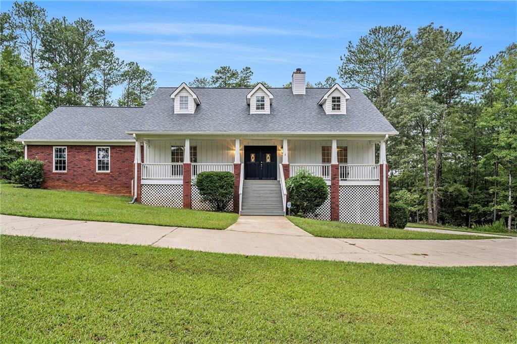 This beautifully updated ranch home sits on a spacious 1.25-acre lot and features a fully finished basement with a second kitchen, additional bedrooms, and a full bath. It is really like a 2nd home down there! This is ideal for multi-generational living, a guest suite, or rental income potential. Enjoy privacy and space outdoors, the lot is perfect for gardening, relaxing, or any outdoor activity all while being less than an hour from downtown Atlanta. Come check out this one-of-a-kind home offering modern comfort and versatility!