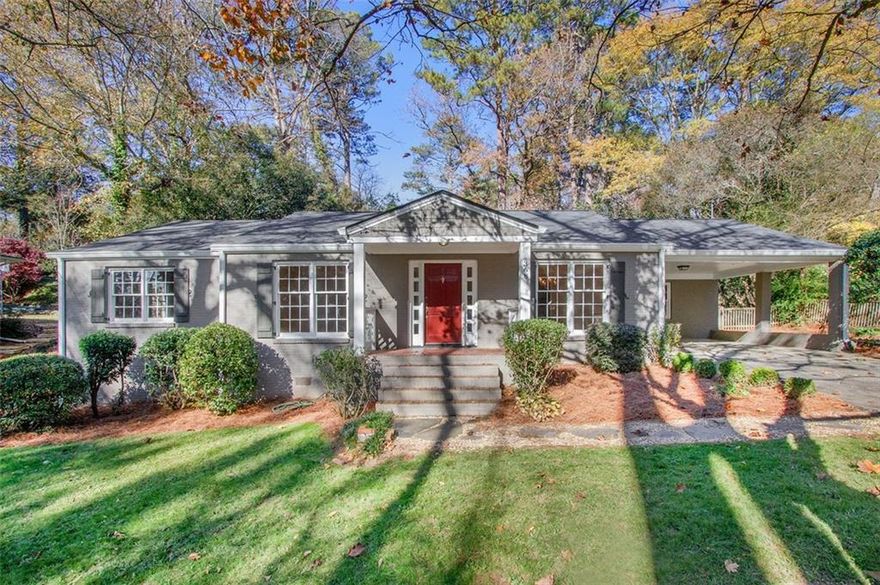 MUST SEE! Lovely North Buckhead mid-century ranch in central location with easy access to Chastain Park, Blue Heron Nature Preserve, multiple shopping centers, Sarah Smith ES, and PATH 400. Huge family room, updated kitchen with stainless steel appliances, stone countertops, tons of storage. The fireside keeping room provides open concept entertaining space. Updated master bathroom is bright with clean lines yet provides a vintage feel. 4th bedroom makes a great nursery, guest room, office, or den. Tranquil, fenced-in backyard with patio great for children or pets! 2-car carport and large driveway make this a great home for entertaining. New roof, A/C, and electrical system, fresh paint, and newly refinished hardwood flooring throughout. Move-in ready! Brand new concrete driveway installed beginning of March 2025.