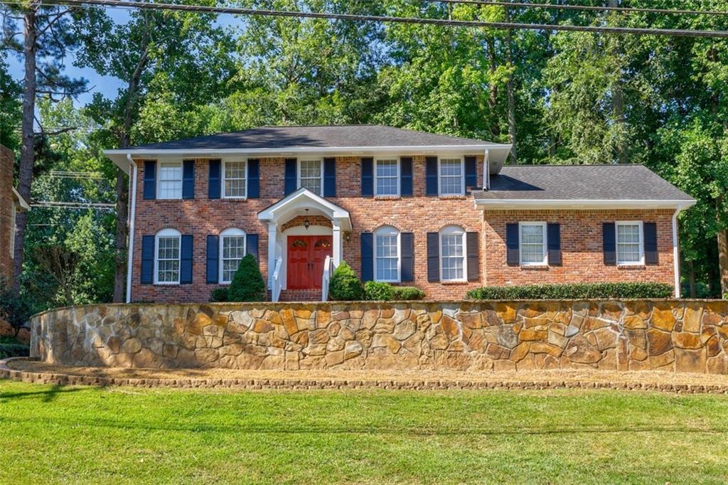 BEST PRICE & Fantastic Opportunity to Live in Top-Rated Austin Elementary School District! Walking Distance to Austin ES and Dunwoody Nature Center, this Home is Move-In Ready and Nicely Upgraded and Renovated Throughout with a Fabulous Level Backyard! Newer Kitchen with New Wood Cabinetry, Stainless-Steel Appliances and Granite Offers Great Space to Cook/Entertain + a Desk Area and Sunny Breakfast Area. Bright Fireside Family Room Features a Bay Window & Walkout Access to the Large Level Private Backyard and Patio! Beautiful Separate Dining Room & Living Room/Office on the Main Level long with Fresh Paint, Hardwood Flooring + Recessed Lighting! Upstairs the Spacious Primary Suite Offers a Walk-In Closet with Renovated Bathroom! Versatile Finished Basement for Entertainment, Play & Exercise Along a Clean Dry Storage Space! The Front Yard Has Been Landscaped with a Beautiful Stone Retaining Wall. This Home has Access to a Quiet and Peaceful Trail Leading Directly to Dunwoody Nature Center and Austin! Just a Few Minutes from Dunwoody Village, Shopping/Dining & GA400 - Plus Option to Join Very Popular Mill Glen Swim/Tennis Club!