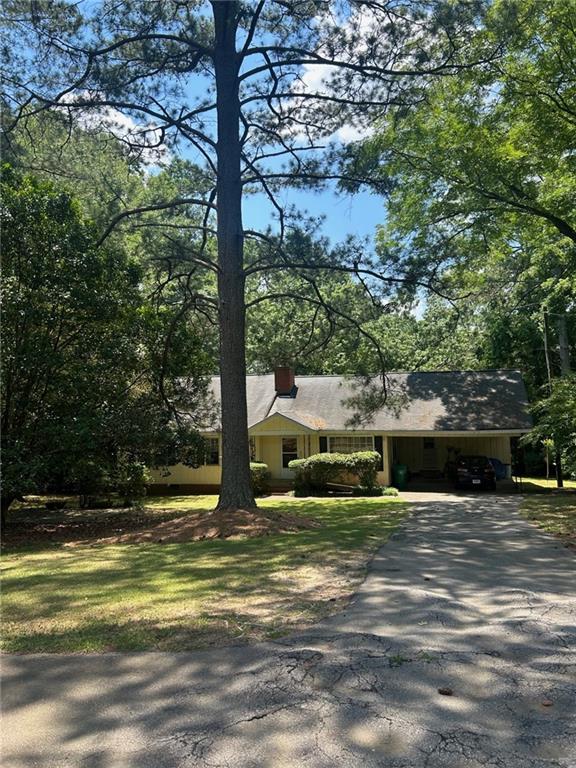 COMING SOON!
This a Great Opportunity for a New Construction Build on City Sewer, OR a Full Renovation Project in The Oak Grove-Decatur neighborhood! This a Beautiful 1.1-acre lot, and the original structure sits far back on the land for even more privacy. Ranch style home is a 4-side wood structure and walk out grade in back. This home has a Total of 3 bedrooms  and 1.5 bath with a bonus room and small office area. You have 2 bedrooms 1.5  bath on the main level, and 1 bedroom upstairs. 
Also, a 1 block walk down to the neighborhood pool on a dead-end street for very low traffic makes this a good option for a family with kids. The location is close to Shopping, Restaurants, New CHOA Hospital & Emory/CDC, and I-85 and the new multi-use walking path. Award Winning Oak Grove elementary school is only 3 minutes drive away (1.5 mile).
Lots of Newly Built homes in the neighborhood. HOME IS BEING SOLD "AS/IS", WITH NO SELLERS  DISCLOSURE.