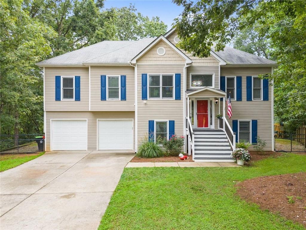 Spacious 5BR/3BA home on 1.29 acres in Dahlonega—NO HOA! This family-friendly property features an open layout with a large family room, bright kitchen, and private primary suite. Great enteratining space and plenty of parking in a cul-de-sac lot. Finished lower level offers extra bedrooms and flex space for guests, office, or playroom. Outside, enjoy your own backyard retreat with an above -ground pool, hot tub, and plenty of room to play or relax. Conveniently located near all the local wineries, private lavender farm, GA 400, Gainesville, and Dawsonville. A rare find with space, privacy, and outdoor living in a great North Georgia location! This home is a must see! Sellers are motivated and ready for their next chapter. Call today to schedule your appointment.